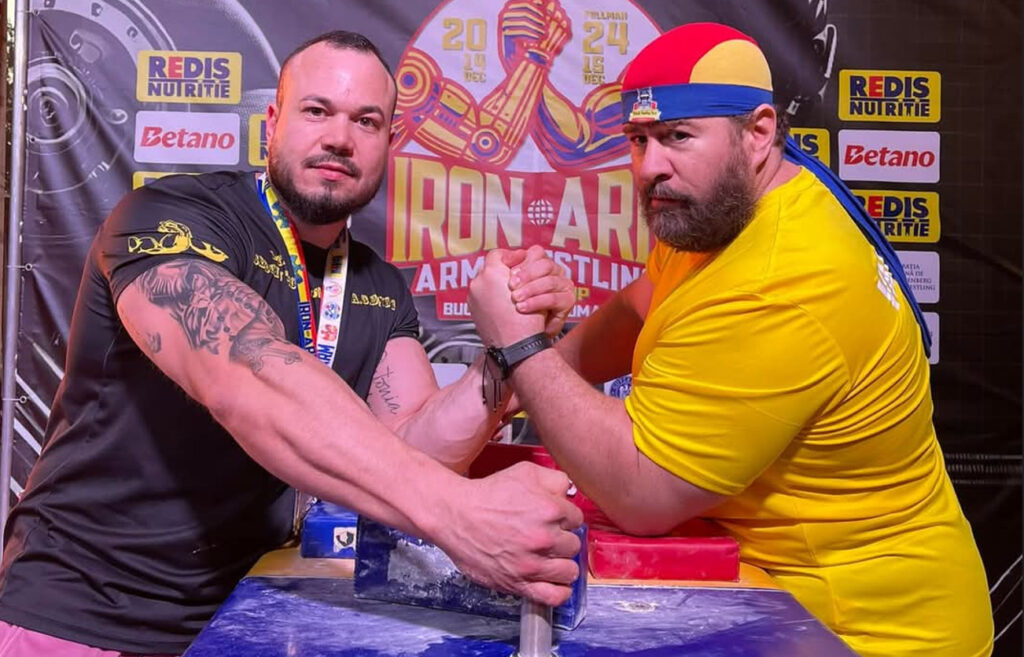 Sergiu Țecu a câștigat două medalii la Cupa Mondială de Skandenberg și a adus mare bucurie orașului Răcari și județului Dâmbovița Sergiu Țecu, un talentat sportiv din Răcari, județul Dâmbovița, a făcut senzație la Cupa Mondială de Skandenberg IronArm 2024